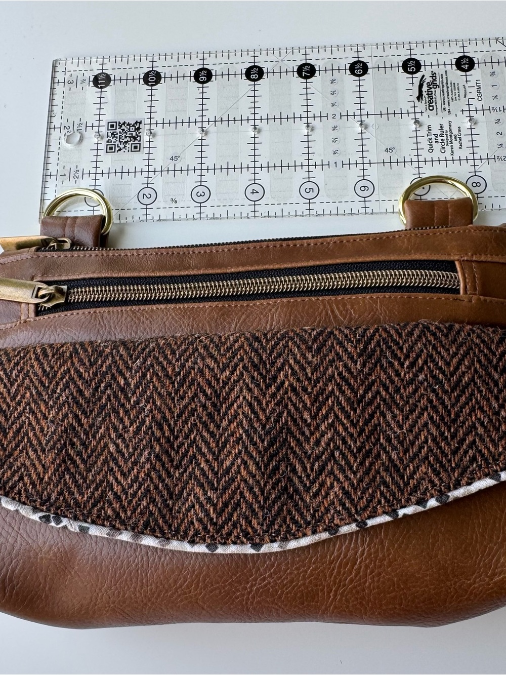 Brown Harris Tweed flap Accent on brown Vegan Leather Main bag 9.5 x6”
